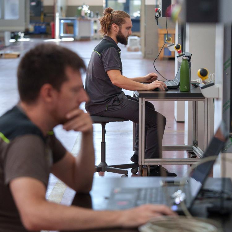 Operators working at their laptops